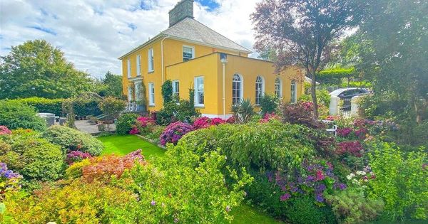 Picture perfect, pretty pastel property by the sea with stunning Instagram-worthy interiors