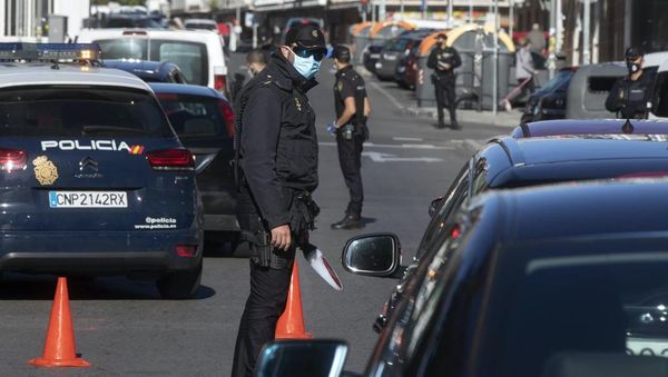 Madrid begins partial virus lockdown amid political battle