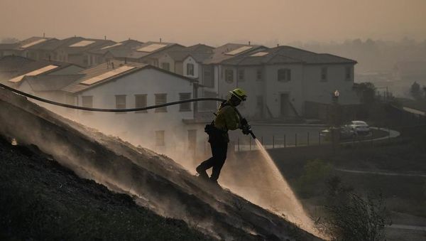 Tens of thousands evacuated as crews battle California wildfires