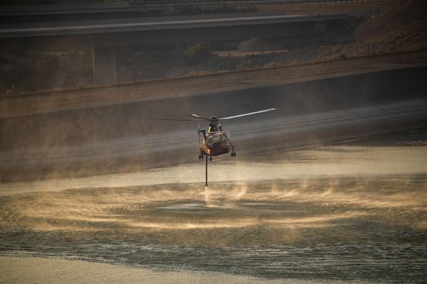 Firefighters gaining control over Orange County blazes that forced 100,000 from their homes