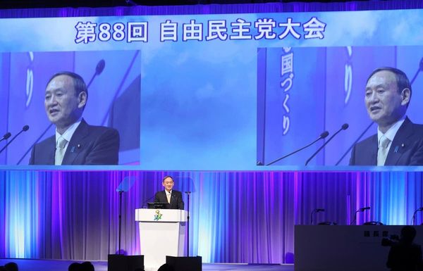 Japan PM vows no virus rebound as emergency measures end