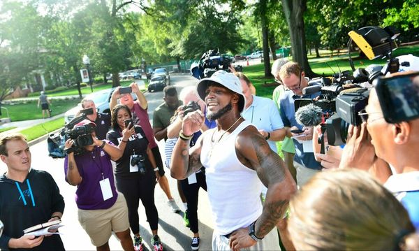 Jeremy Chinn arrives in Julius Peppers jersey