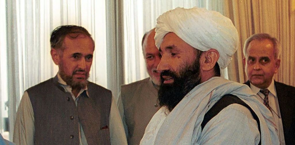 Who is Mullah Hasan Akhund and what does the Taliban's…
