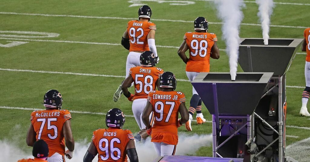 Bears unveil new throwback uni: White jersey, striped socks and no