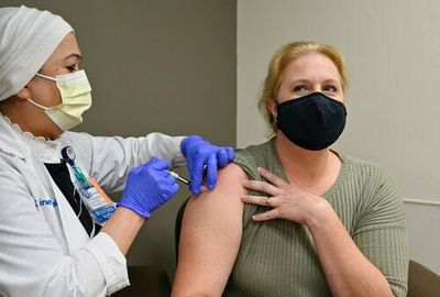 Here's what to expect from the COVID booster as far as side effects