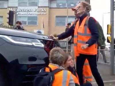 Video shows mum on school run driving into Insulate Britain protestors