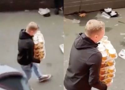 Dutch football fan becomes instant hero after effortlessly carrying 48 pints in one go