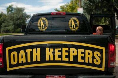 A new report found nearly 30 elected officials with ties to the far-right Oath Keepers