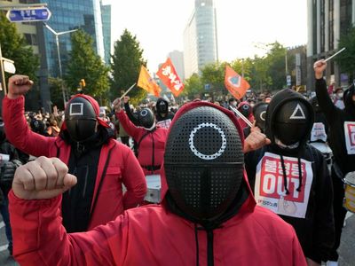 South Korean workers wear ‘Squid Game’ outfits during protest for better work conditions