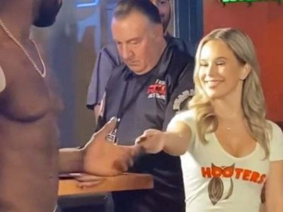 MMA fighter claimed he ‘turned down Hooters waitress’ - she says she was just handing him a coupon