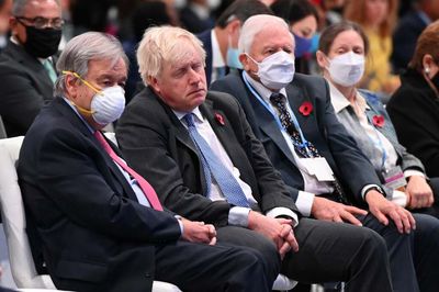 Photo of Boris Johnson maskless and with his eyes closed next to David Attenborough causes uproar