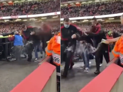 Video shows rugby pitch invader being soaked with beer by furious fans