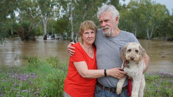 Four people rescued from flash flooding in NSW as low pressure system sloshes across the country