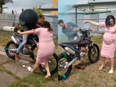 Gender reveal goes horribly wrong as father nearly runs over pregnant partner with motorbike burnout