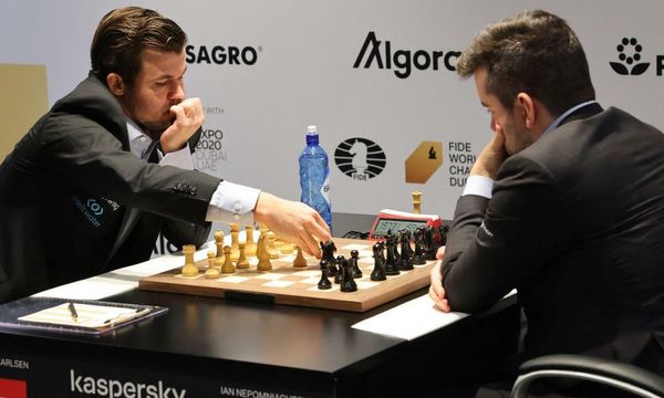Chess-Carlsen blows Nepomniachtchi away to claim fifth world title
