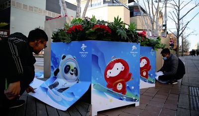 Winter Games mascot posters to help lift spirits in Beijing