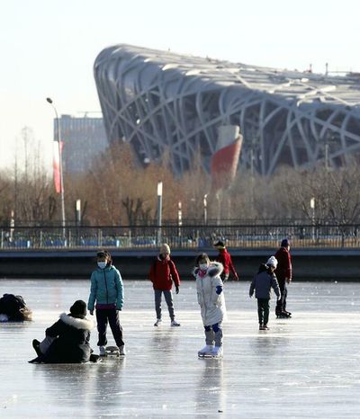 Beijing tries to spark Olympic mood in final 3 weeks