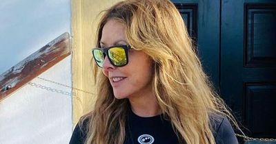 Carol Vorderman, 61, soaks up the sun in skintight sportswear on Portugal health retreat