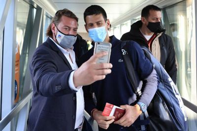 Djokovic back in Serbia after deportation