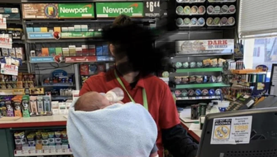 Photo of woman working at a cash-register with newborn baby horrifies the internet