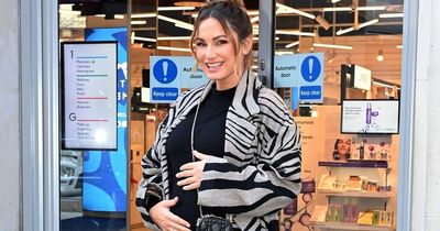 Sam Faiers glows as she cradles her growing bump ahead of 'spring baby'
