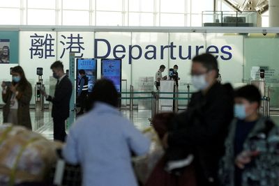 Hong Kong police arrest two ex-flight attendants over COVID-19 rule breach