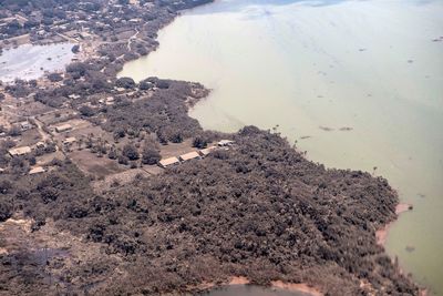 Volcanic ash delays aid to Tonga as damage reports emerge