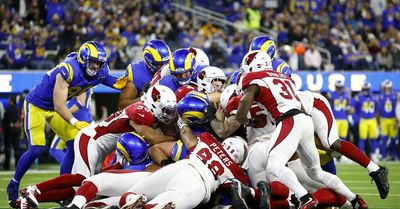 Stafford propels Rams in rout of Cardinals