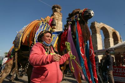 AP PHOTOS: Bejeweled camels wrestle for victory in TurkEY