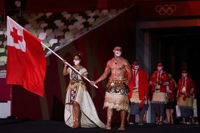 Tongan Olympic flagbearer Taufatofua prays for news of father