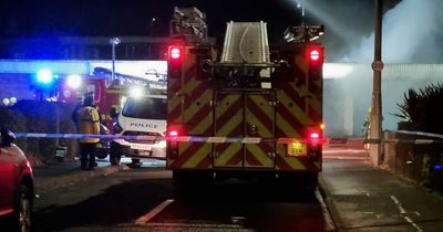 Edinburgh firefighters tackle shop blaze as smoke and flames fill the sky