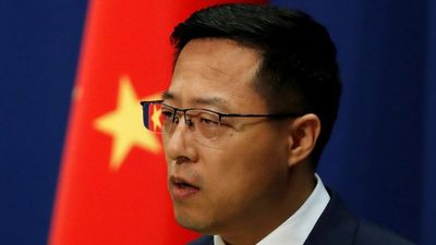 China says Australia is trying to interfere with its legal system in case of Australian writer Yang Hengjun