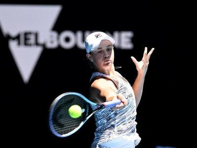 Barty blitzes her way into Open's last 32