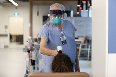 ‘Scarred for life’: Australia COVID wave heaps pressure on nurses