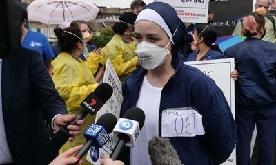 NSW, Victoria, SA and ACT cut Covid vaccine booster interval as Sydney nurses protest conditions