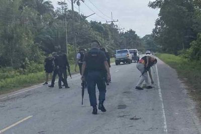 Police pickup damaged by bomb