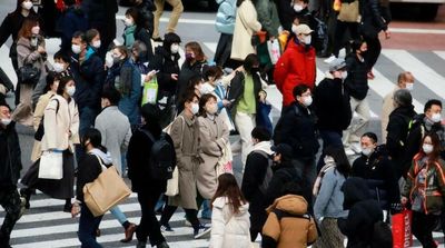 Japan Widens COVID Curbs, Including in Tokyo, as Cases Surge