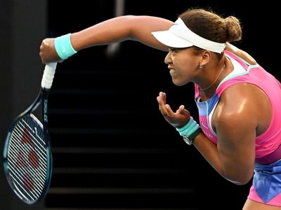 Osaka pushes through to Open third round