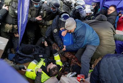 Ukrainian police scuffle with Poroshenko supporters as Blinken visits