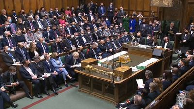 Boris Johnson faces repeated calls to quit during bruising PMQs session