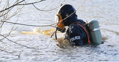 Underwater search teams enter lake at city park