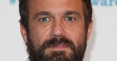 Hollyoaks star Jamie Lomas shares sweet family snap of himself with his famous sisters