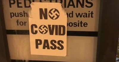 Outrage as sickening swastika stickers appear on traffic lights in Bury