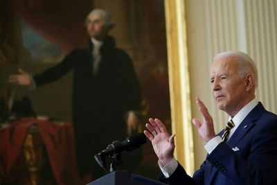 Biden touts 'enormous progress' in pandemic-blighted first year