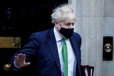 Calling UK PM "disgraceful", Conservative lawmaker defects to opposition