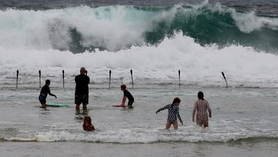 Waves for the camera! Splashing about at the ocean baths