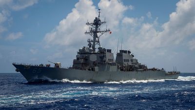 China says it warned away U.S. warship in South China Sea, U.S. denies