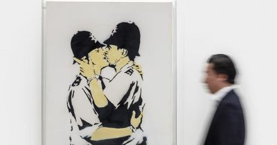 Banksy's Kissing Coppers and Girl With Balloon from Robbie Williams collection being sold