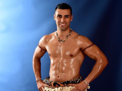 Topless Tongan Olympic flag-bearer raises $380,000 in disaster aid