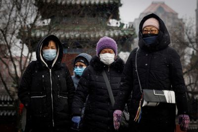 China's local COVID cases fall while infections grow in Beijing city